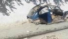 Old abandoned car carcass on Haiti sidewalk