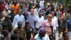 President Michel Martelly walking in a crowd of Haitians