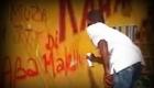 Aba Martelly - Yon Manifestan ap pentire nan yon mur