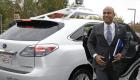 Haiti prime minister Laurent Lamothe getting out of the Google driverless car