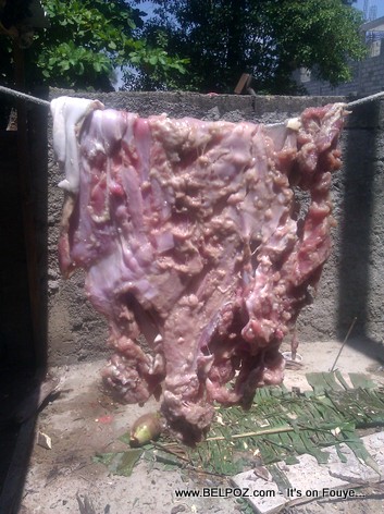 Haitian Food - Seasoned goat meat drying in the sun (Vyann kabrit nan soley pou seche)