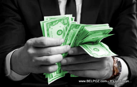 PHOTO: Money in Hand - Dollar Bills