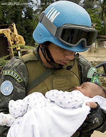 MINUSTAH Soldier Hoding a Haitian Baby