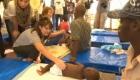Sarah Palin Touching A Sick Baby In Haiti