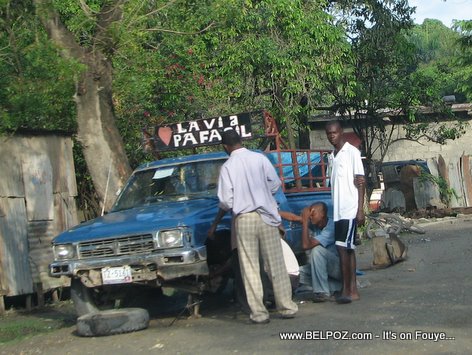 Haiti Auto Repair - Fixing A Flat Tire - Trou-Du-Nord Haiti